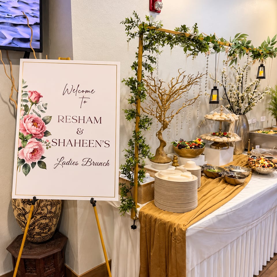 Ladies brunch buffet with floral decorations at Kabob Cafe & Grill.