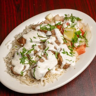 Lamb Seekh Kabob Over Rice